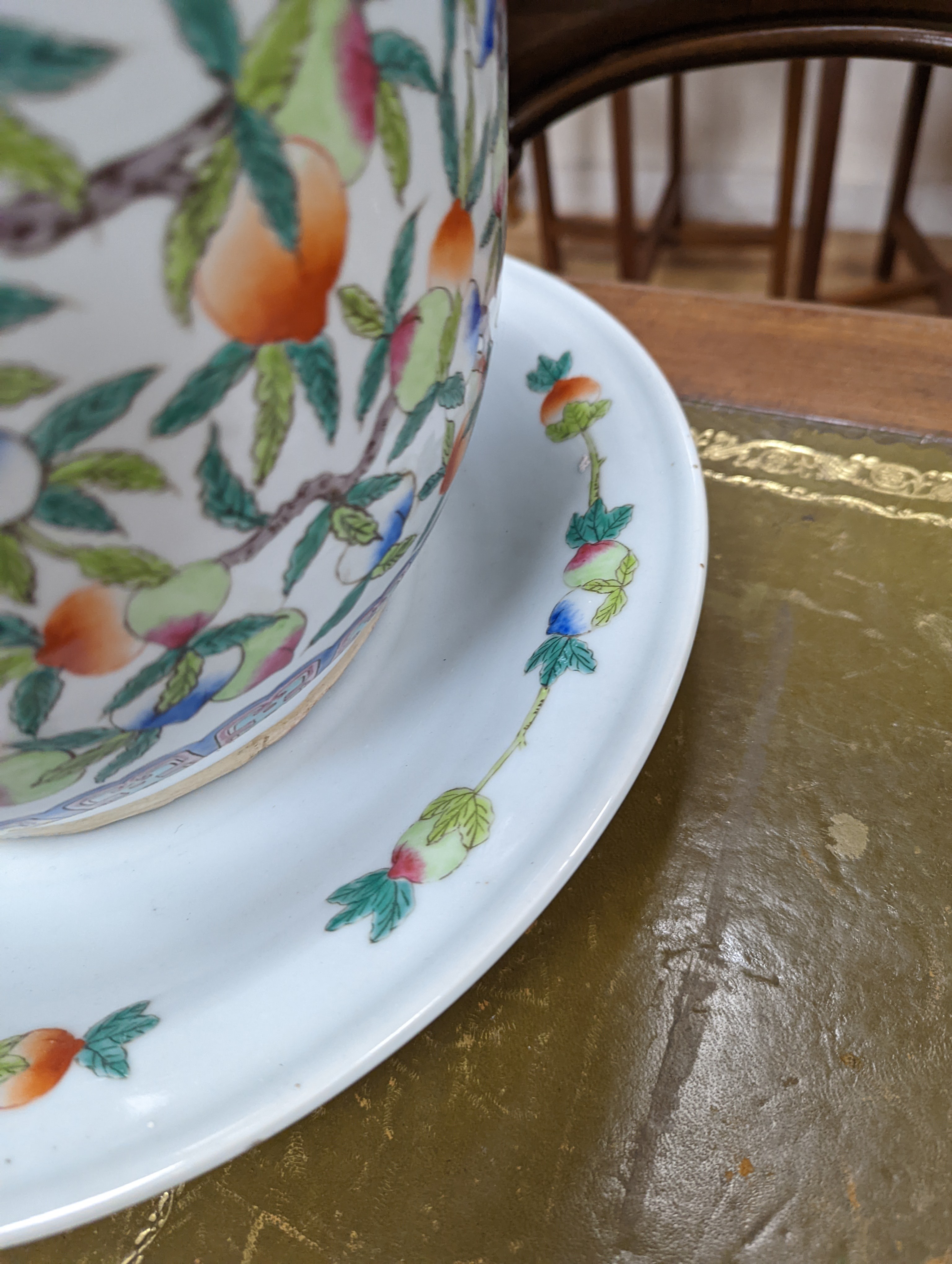 A 20th century Chinese porcelain jardiniere and dish, diameter 36 cms.